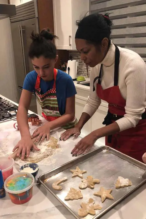 Harris Faulkner and one of her daughters baking