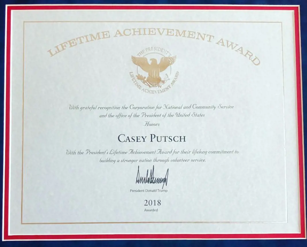Casey Putsch getting President Lifetime Awards for his volunteer services