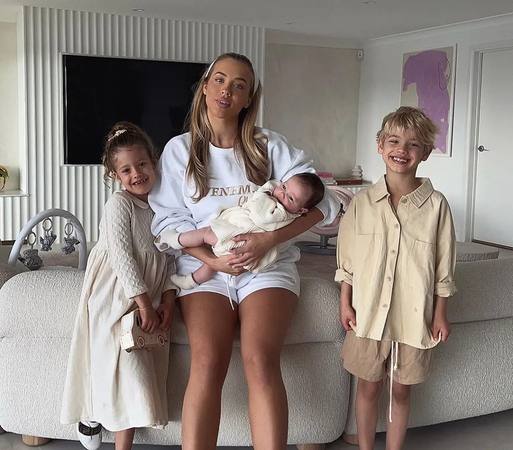 Tammy Hembrow pictured with her three children.