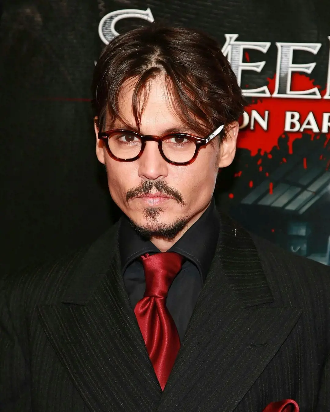 Depp attended the premiere of his movie 'Sweeney Todd' in New York on 3 December 2007 donned in a dark suit, and red tie