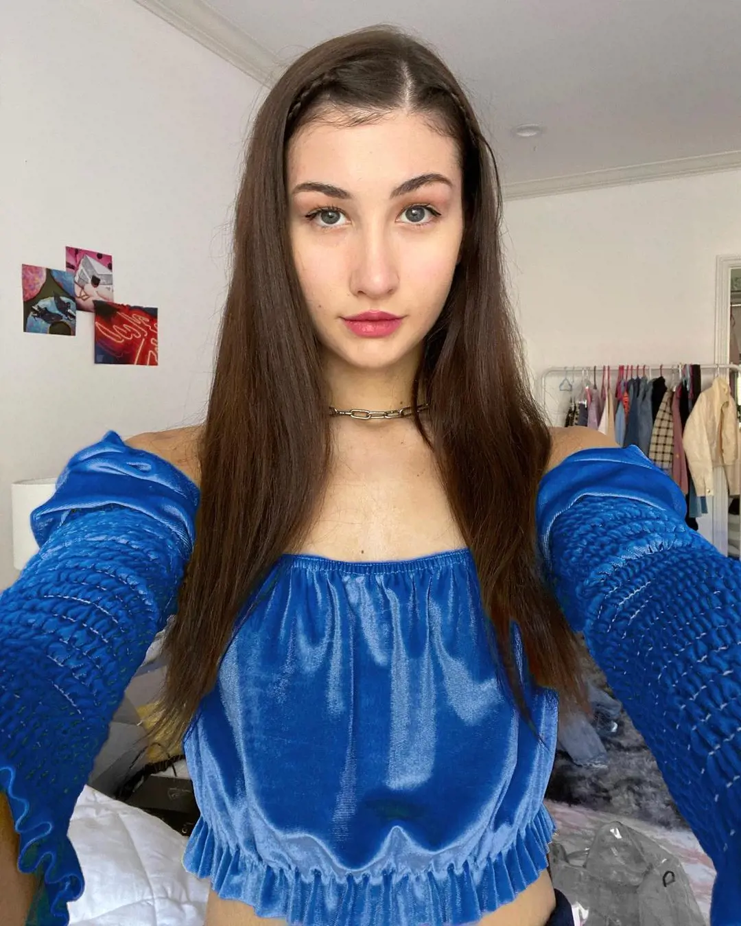 Meg uploaded her picture wearing a blue off-shoulder top on December 9, 2019