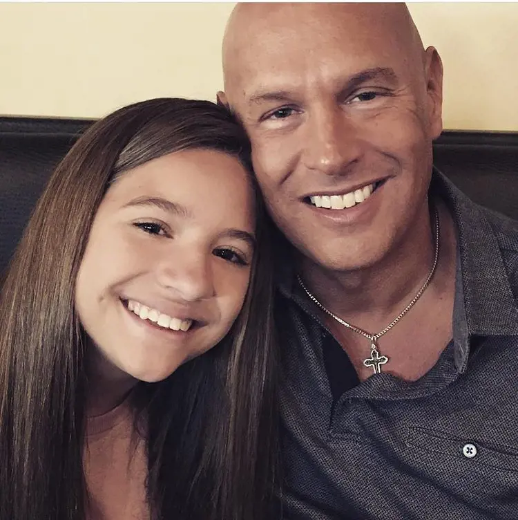 A picture of Mackenzie with her dad