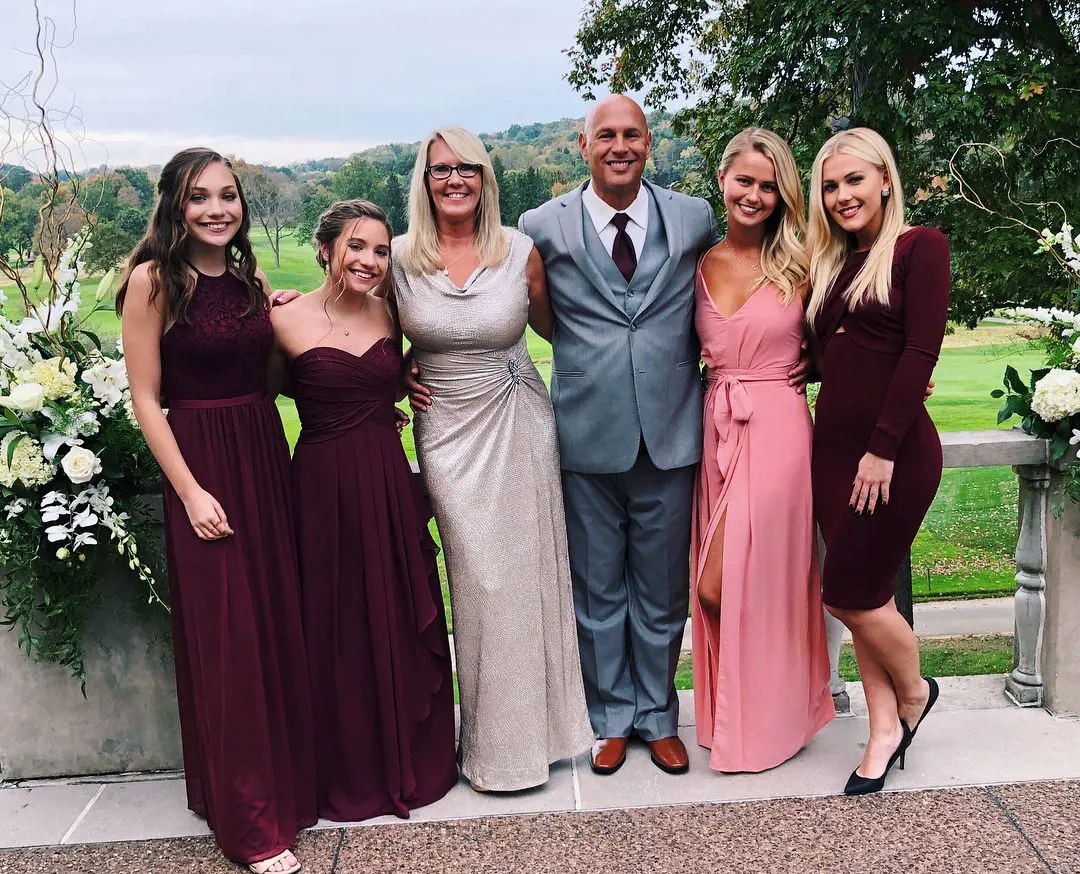 The Ziegler sisters with father Kurt, step mother Michelle and friends