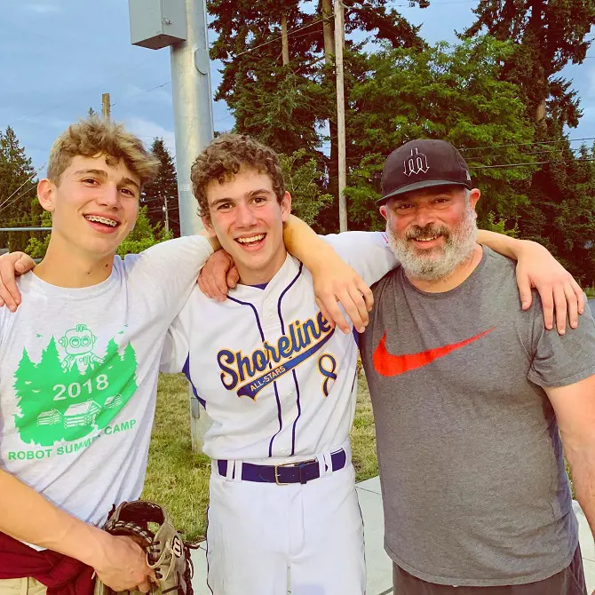 Nate with his two sons during high school basketball game on 11 July, 2019 