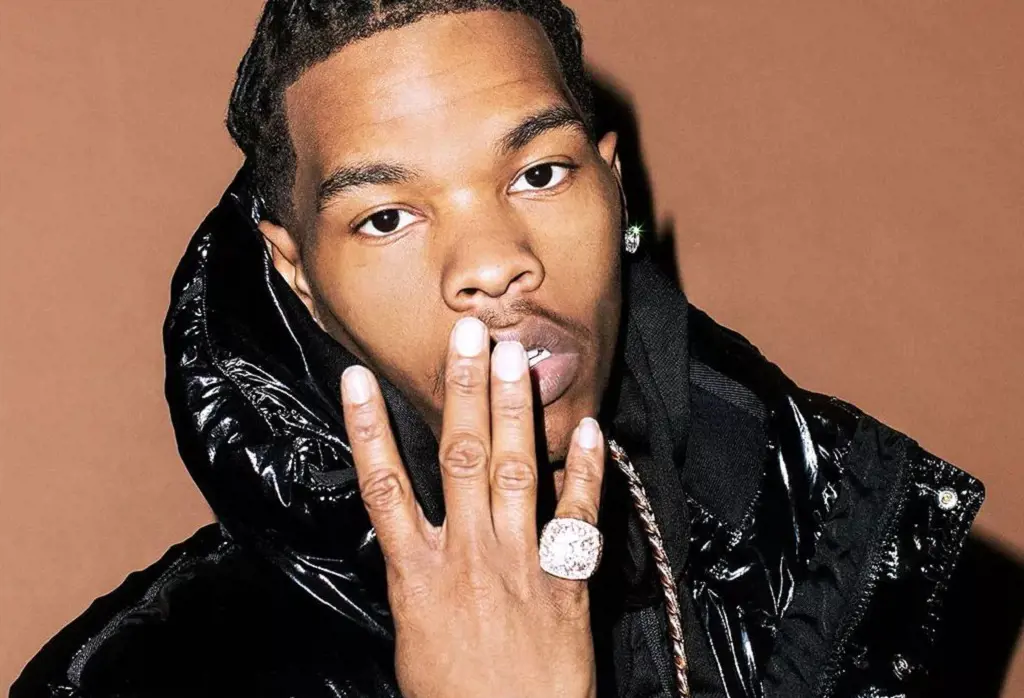 American rapper Lil Baby looks cool as he does the viral pose with a diamond ring in January 2023