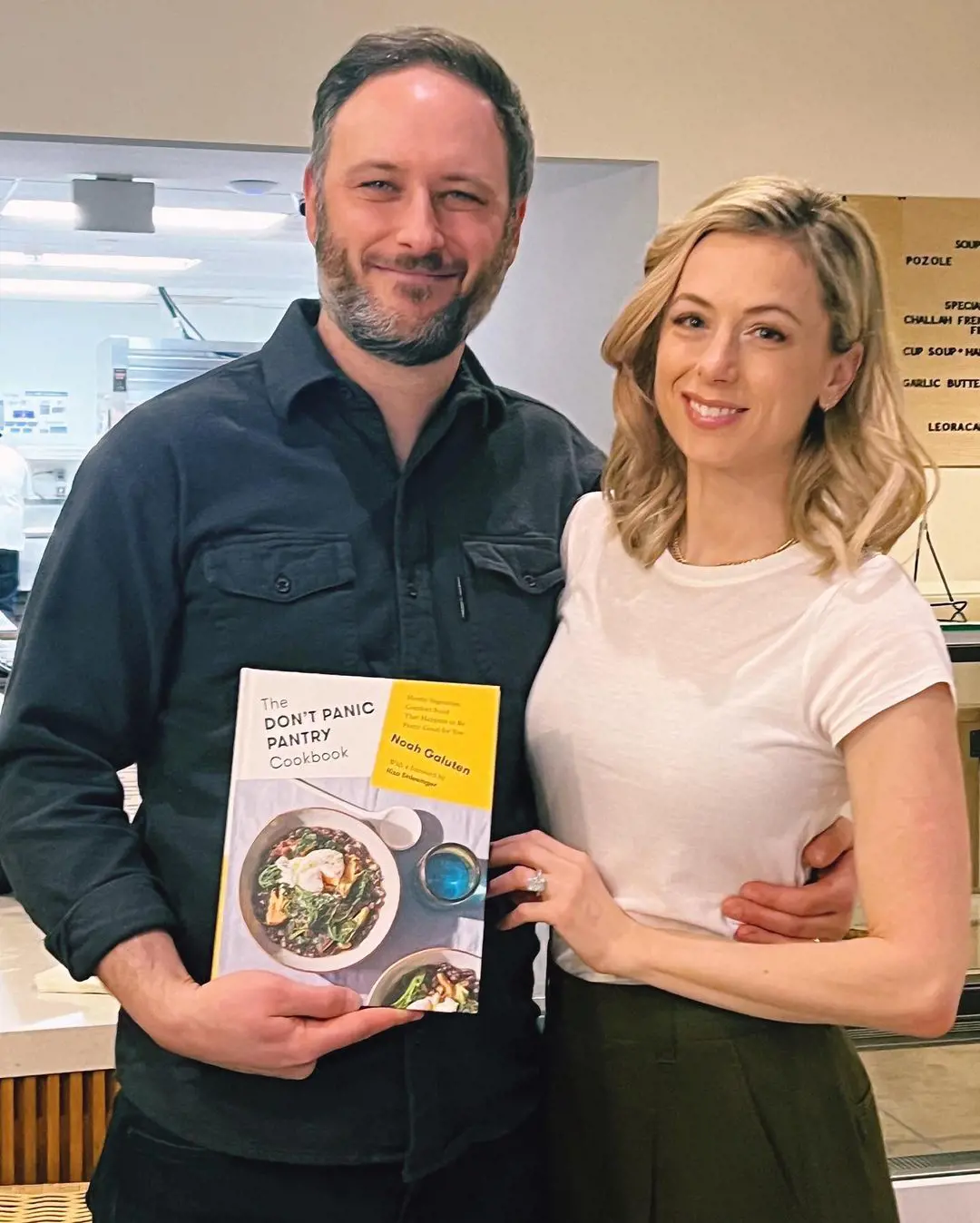 Noah and Shlesinger flaunt 'Don't Panic Pantry' cookbook published by Noah in January, 2023