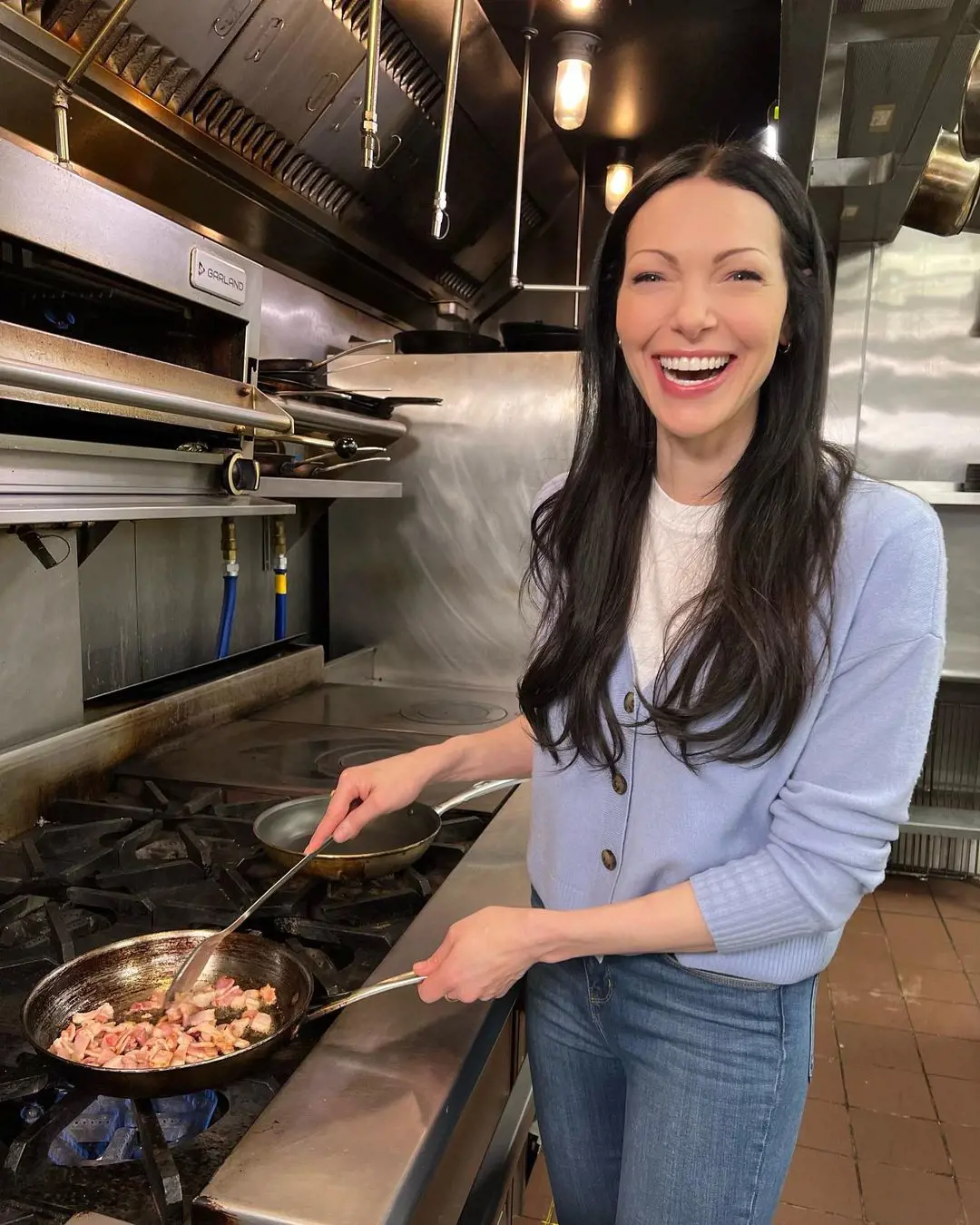 Laura looks delightful as she gets captured while cooking one of her nutritious meal