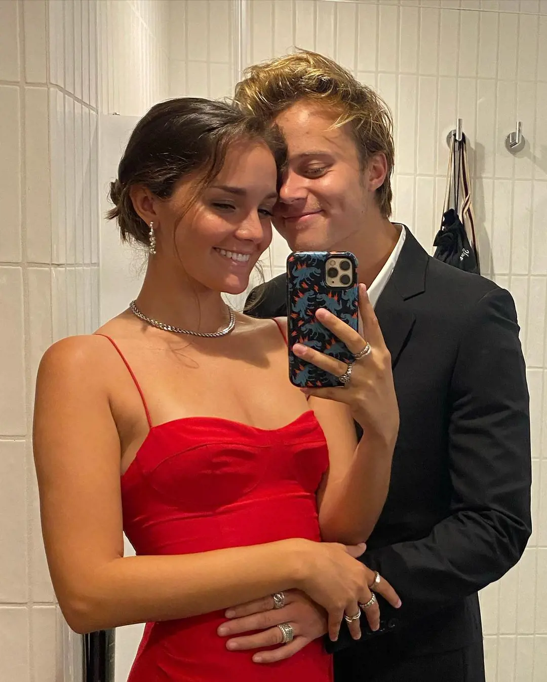 The lovebirds take a mirror selfie with Siemek looking gorgeous in a red dress while her beau donned a suit in as they had a fun night full of dancing in September 2021 in New York City 