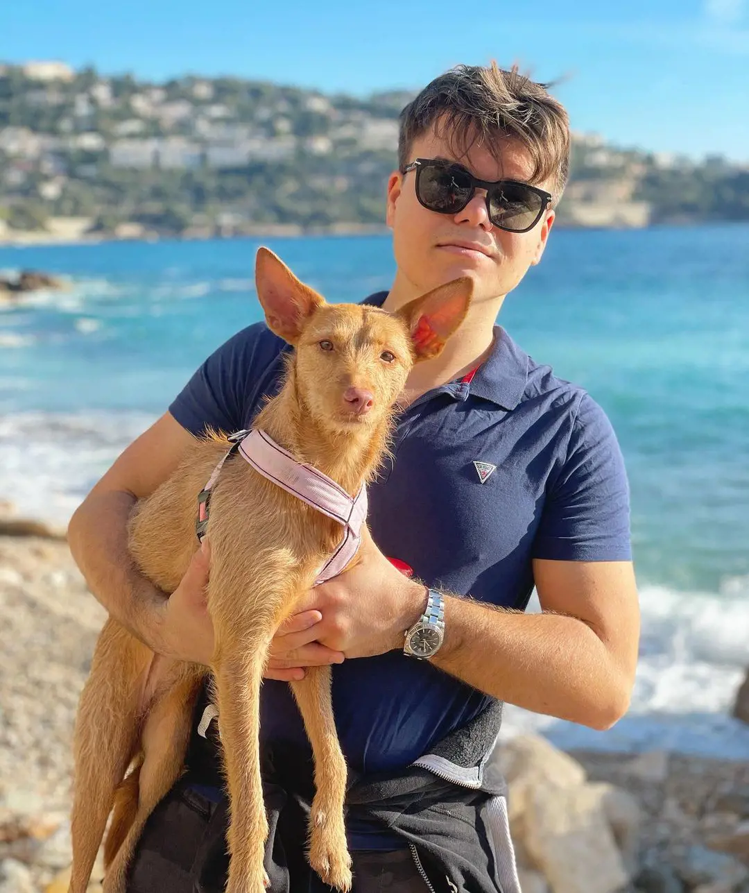 Jelly with his dog Nala enjoying the beach in Monte-Carlo, Monaco on January 29, 2021.