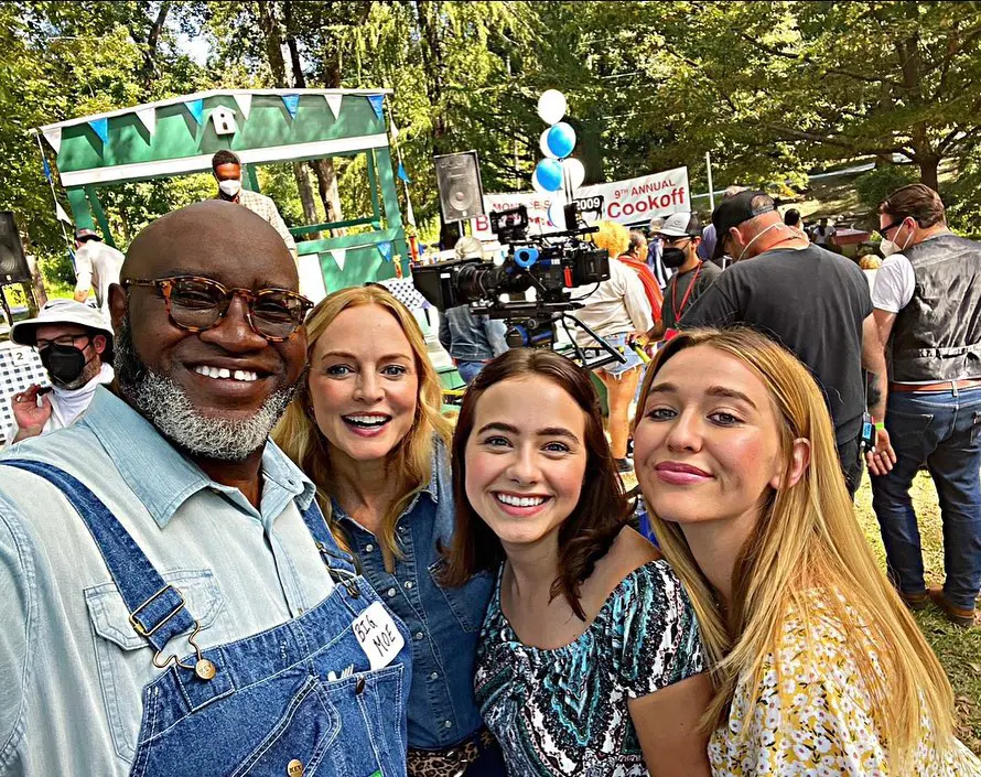 Maggie, Bailey and Teri [ from the right] on the set of the movie with TV personality Moe Cason