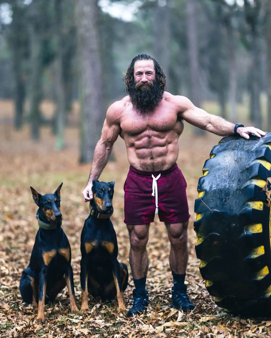 Liver King aka Brian Johnson Pictured With His Dogs And A Huge Tire On 16 February 2023